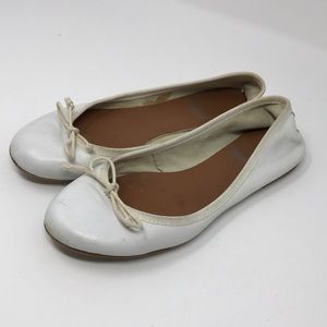 White ballerina flats